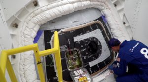 Boeing pad operations team closes the hatch to Starliner. 